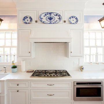 Blue and white kitchen showcases client's china