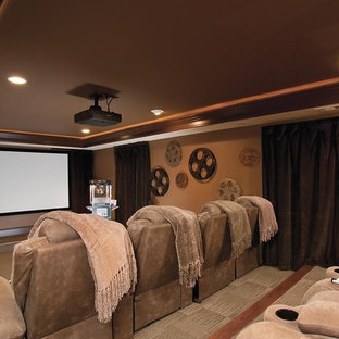 Elegant home theater photo in Atlanta with a projector screen