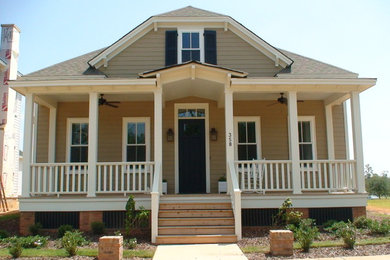 Mid-sized craftsman beige one-story concrete fiberboard exterior home idea in Other