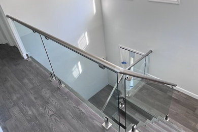 Inspiration for a transitional staircase remodel in Miami