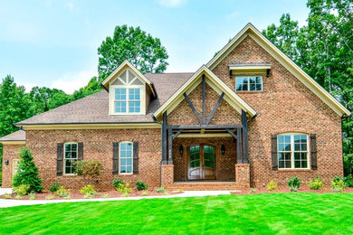 Rustic exterior home idea in Raleigh
