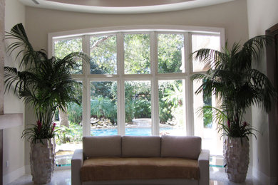 Family room - mediterranean family room idea in Miami