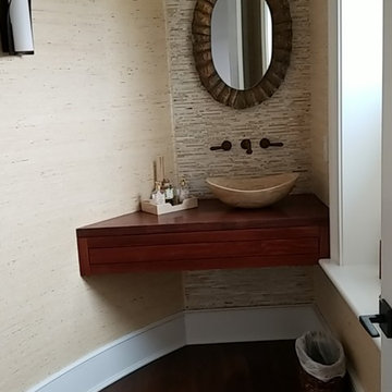 Powder Room with 1x4 random yellow Onyx STONE back splash