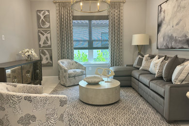 Mid-sized transitional enclosed ceramic tile and gray floor living room photo in Detroit with no fireplace