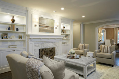 Inspiration for a large transitional formal and enclosed dark wood floor and brown floor living room remodel in Dallas with gray walls, a standard fireplace, a stone fireplace and no tv