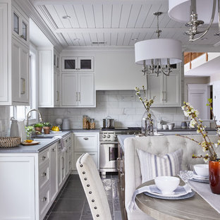 Design ideas for a mid-sized traditional l-shaped kitchen pantry in New York with an undermount sink, beaded inset cabinets, white cabinets, quartz benchtops, white splashback, marble splashback, stainless steel appliances, limestone floors, with island, grey floor and grey benchtop.