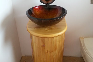 Example of an arts and crafts powder room design in Burlington