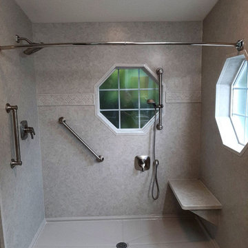 Roman Stone shower with smooth walls and bench seat