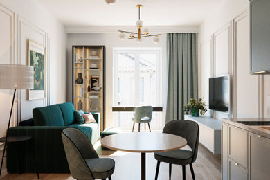 Inspiration for a small eclectic open concept light wood floor living room remodel in Other with white walls