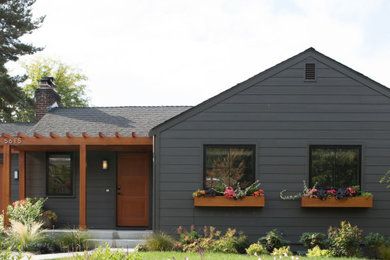 Example of a transitional exterior home design in Seattle