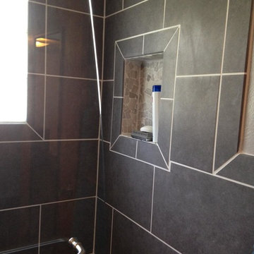 Remove tub and replace with a walk in shower.