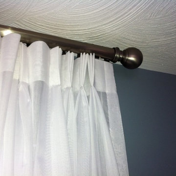 Pinch pleat Sheers on traversing rod
