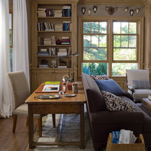 couches with desks behind them
