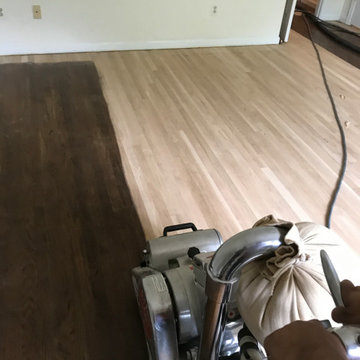 Previously stained wood flooring.  Sanding back to Natural .