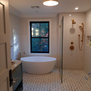 Luxury onsuite guest bathroom with NuHeat heated floor.