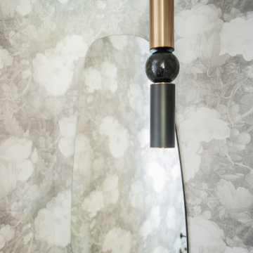 Natural Texture, Refined Contrast: One Thoughtful Vision in Two Bathrooms