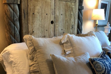 Inspiration for a large shabby-chic style master carpeted and beige floor bedroom remodel in Houston with beige walls and no fireplace