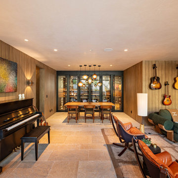 Modern Bronze Steel Wine Wall and Liquor Display in Luxury Custom Home Basement