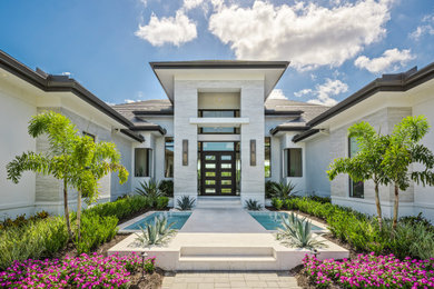 Inspiration for a transitional exterior home remodel in Miami