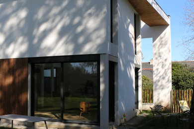 Réalisation d'une façade de maison design.