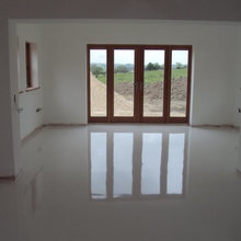SEAMLESS WHITE POURED RESIN AND RUBBER FLOORING SYSTEMS