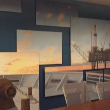 Mural of nautical scene - cargo ship on ocean and oil rig