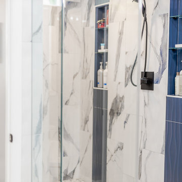 Bathroom remodeling in Columbia, MD with double vanity & marble bathtub