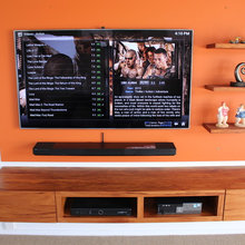 Orange floating wall rimu entertainment Unit