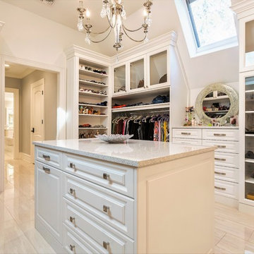CHIC HER MASTER CLOSET WITH ANGLED CEILINGS