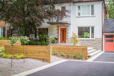 Design ideas for a large partial sun landscaping in Toronto.