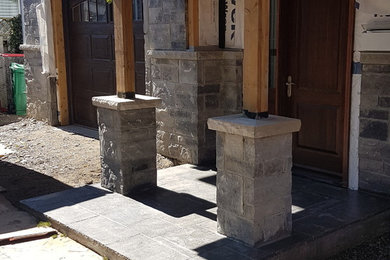 Flagstone walkout with stone piers