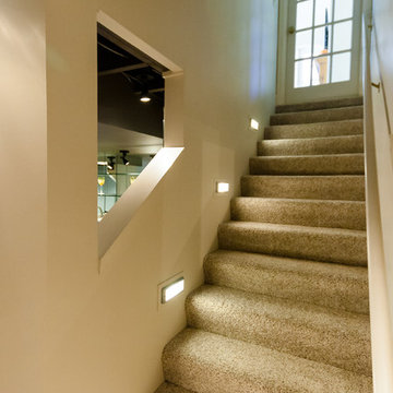 Ladue Home Renovation for Media Room, Exercise Area, & Bar