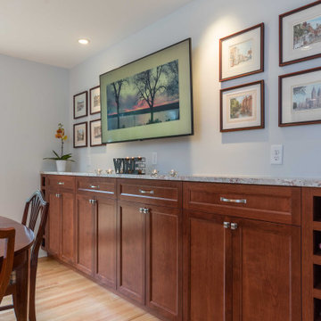 Modern Kitchen with White Flat Panel Shaker Cabinets & Natural Stone Backsplash