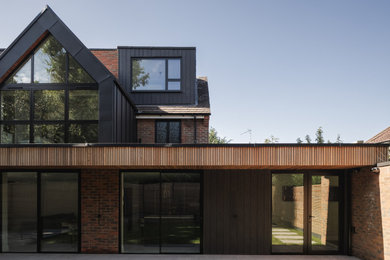 Photo of a contemporary house exterior in Hertfordshire.