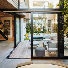 Corner glass wall