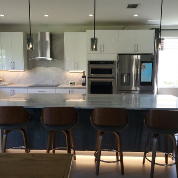 Stunning Kitchen Remodel Done in White and Gray Cabinets