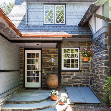 Sophisticated Mudroom and Garage