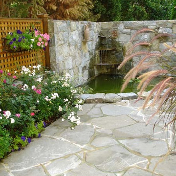 Tiered Waterfall with Fieldstone Wall and Patio