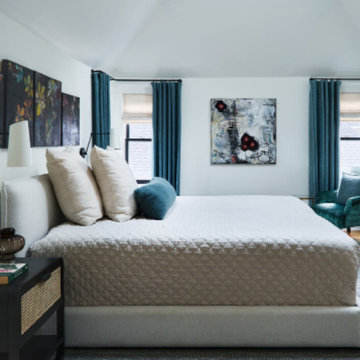 Eclectic Bedroom with Cathedral Ceilings and Contemporary Bed