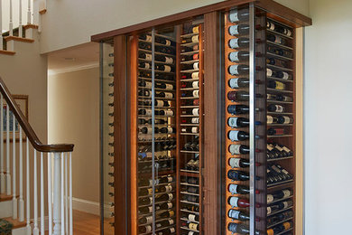 Design ideas for a transitional wine cellar in San Francisco with medium hardwood floors and storage racks.