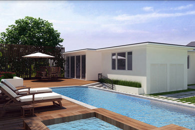 Mid-sized trendy backyard rectangular aboveground pool photo in Los Angeles with decking