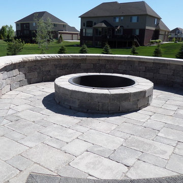 Raised Patio made with Unilock's Pisa Wall, Brussels and lL Campo Pavers