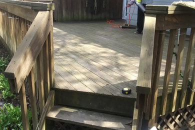 Fixing deck and staining back deck and fixing front porch and paint in the front