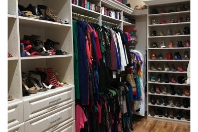 Inspiration for a large timeless closet remodel in Miami