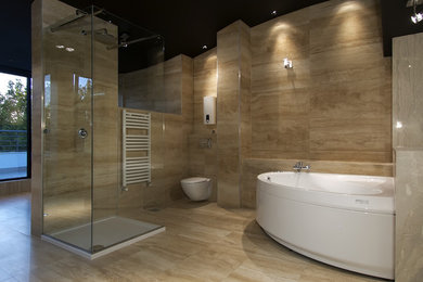 This is an example of an expansive modern bathroom in Orange County.