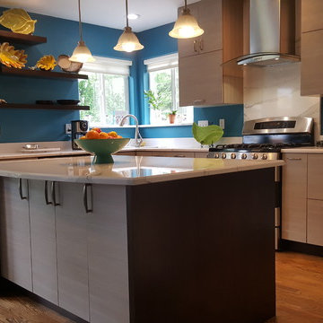 This is a two tone updated kitchen with efficient use of space & feature points