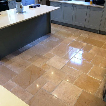 Deep clean and seal of a dirty Limestone tiled kitchen floor in Icklesham