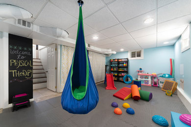 Example of a mid-sized trendy gray floor multiuse home gym design in Philadelphia with blue walls