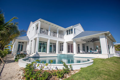 Home design - large coastal home design idea in Tampa