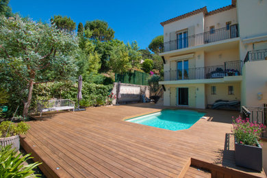 Mid-sized tuscan deck photo in Other